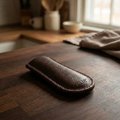The stitched leather handle cover from the kit